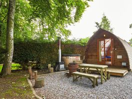 Camping pod with hot tub