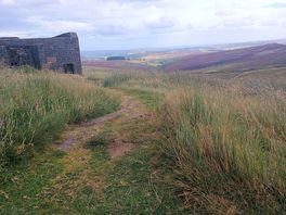 Top withens on pennine way about 1hr walk from site.