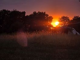 Sunset beside farmers house