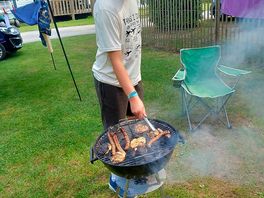 Premium pitch was large with a bbq, table and parasol, lockable shed and a fridge freezer.