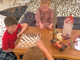 Pretending they know how to play chess
