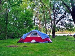 Set up among the trees by the river