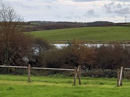 View over the site and lake.