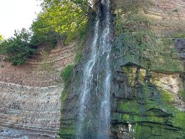 Waterfall on the beach, need to use neighbouring sites parking £4 all day and walkway down.