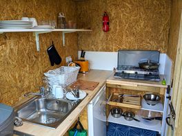External kitchen, where a welcome pack of tea, coffee, milk, bread, welsh cakes etc was left for us