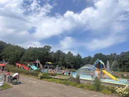 Another angle of the pool. small slides and sprays plus diving boards and bigger slides.