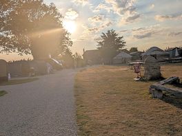 Sun setting down over camp