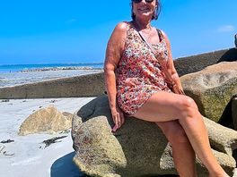 Sat on a rock on the beach