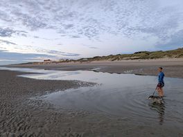 Wide beach with paddling