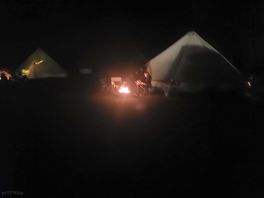 Camping with a camp fire.