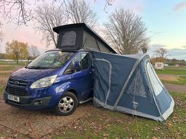 On a pitch near shop with bakery. near showers etc