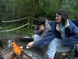Roasting marshmallows from the honesty shop over the provided fire pit