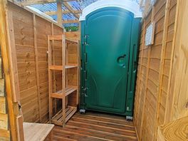 Large private changing area outside each shower.