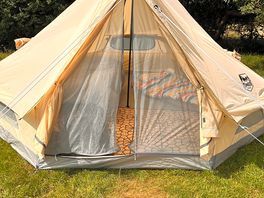 Spacious tent with warm bedding