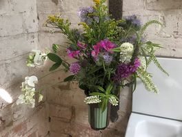 Beautiful cut flowers in the shower room