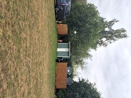 Showing part of toilet an shower block & washing up bit