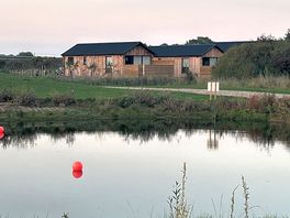 View of lodges across the water