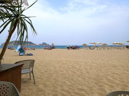 The nearby beach. lovely white sands and very clean.