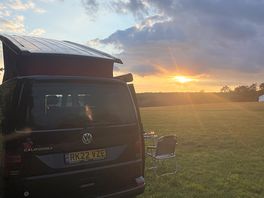 View of camping field at sunset
