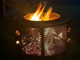 Fire drum hired from site delivered to our pitch by staff along with logs