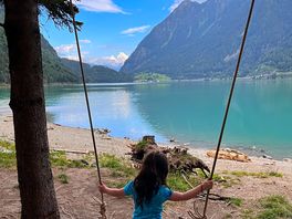 Swing and small play area on the near by lake