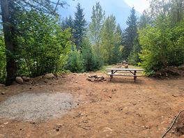 Tent site with picnic table and firepit