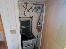 Storage cupbard with steps, games and leflets