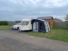 Cherry pitch, plenty of space with private hot tub/patio area.