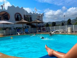 Relaxing at the pool with cocktails