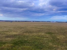 Looking down across the site to holy island