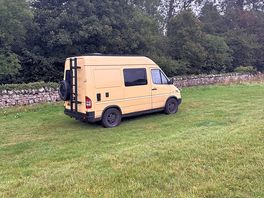 View of camper on field