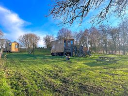 Private garden which is dog proof around the horse box corner