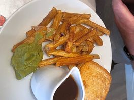 Steak and ale pie chips and mushy peas