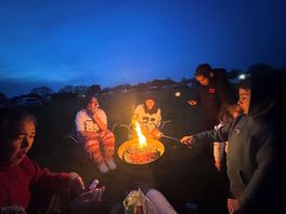 Marshmallows over the fire at night