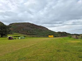 Looking up the field to the rubbish container.