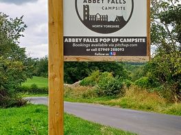 Sign outside campsite.