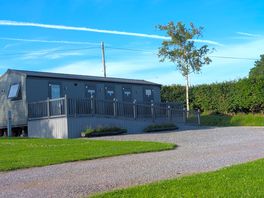 Shower block, kitchen with fridge, washing machine and tumble dryer