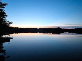 Evening walk by lake on site