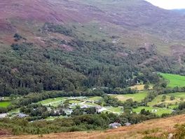 View of campsite from hills above