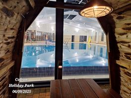 Swimming pool from seats outside.