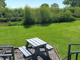 Beautiful garden and patio area overlooking the canal.