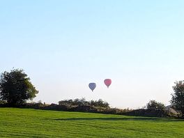 Hot air balloons on the horizon