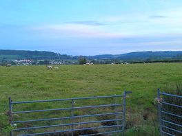 Adjoining sheep field and views.