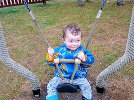 Very happy toddler despite the rain.