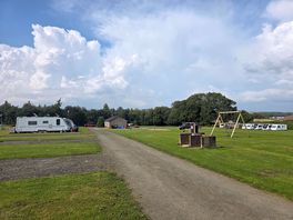 Road up to plots and kids playground