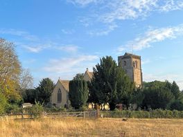 The village church is next to the site