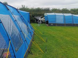 We had a 5m x 3.8m tent and if all tent are facing out from the hedge you will not drive to tent...