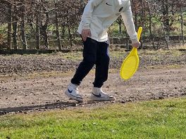 Grandson enjoying the vast space in the tourer pitch to play tenis