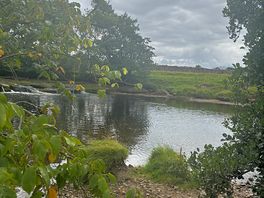 River 2 minute walk away