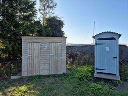 Toilet and shower block